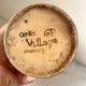 Old vinaigrier in beige sandstone signed Village de France