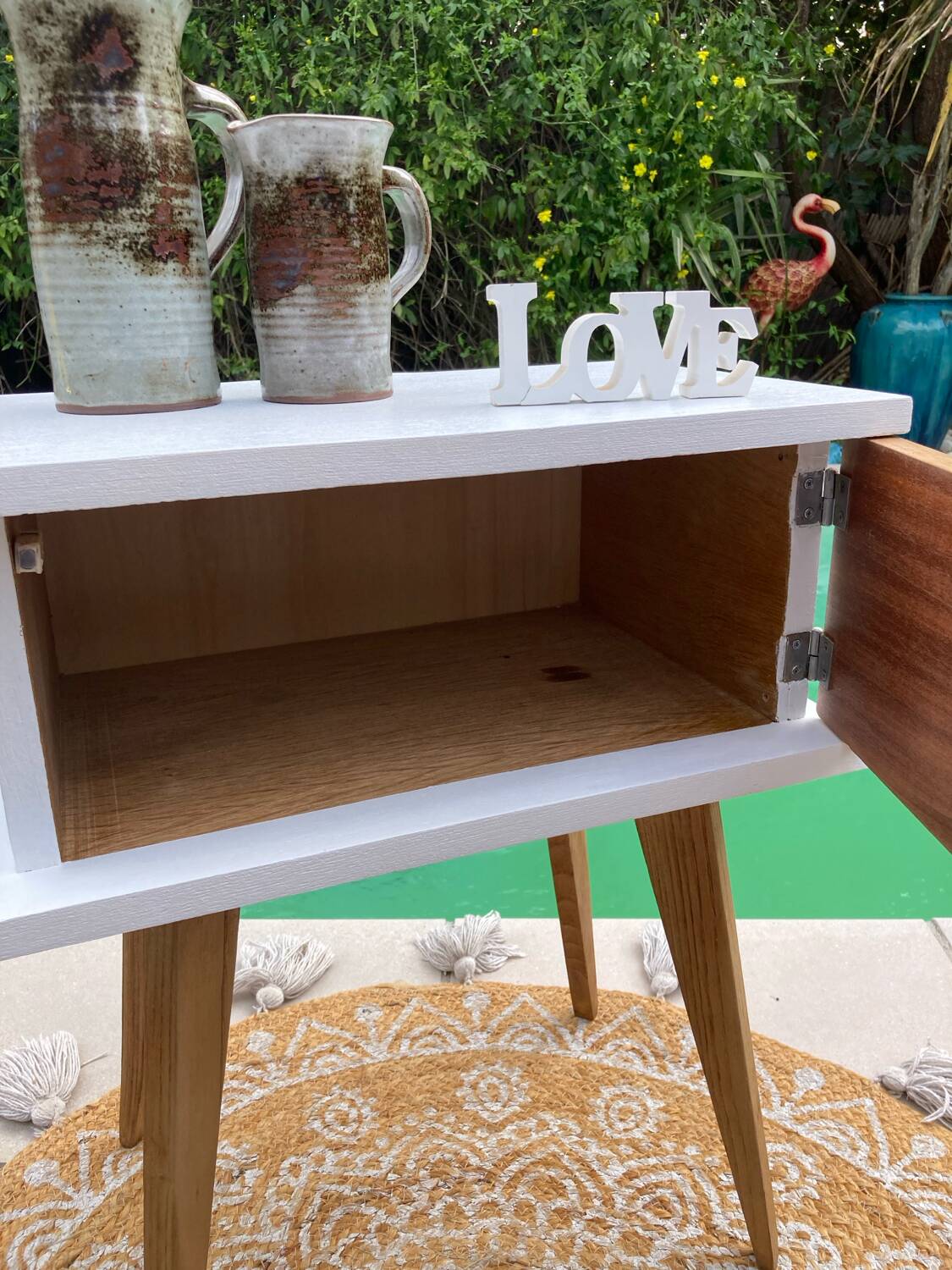 Beautiful vintage bedside table with tapered legs, Scandinavian/pop style in raw white.