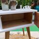 Beautiful vintage bedside table with tapered legs, Scandinavian/pop style in raw white.