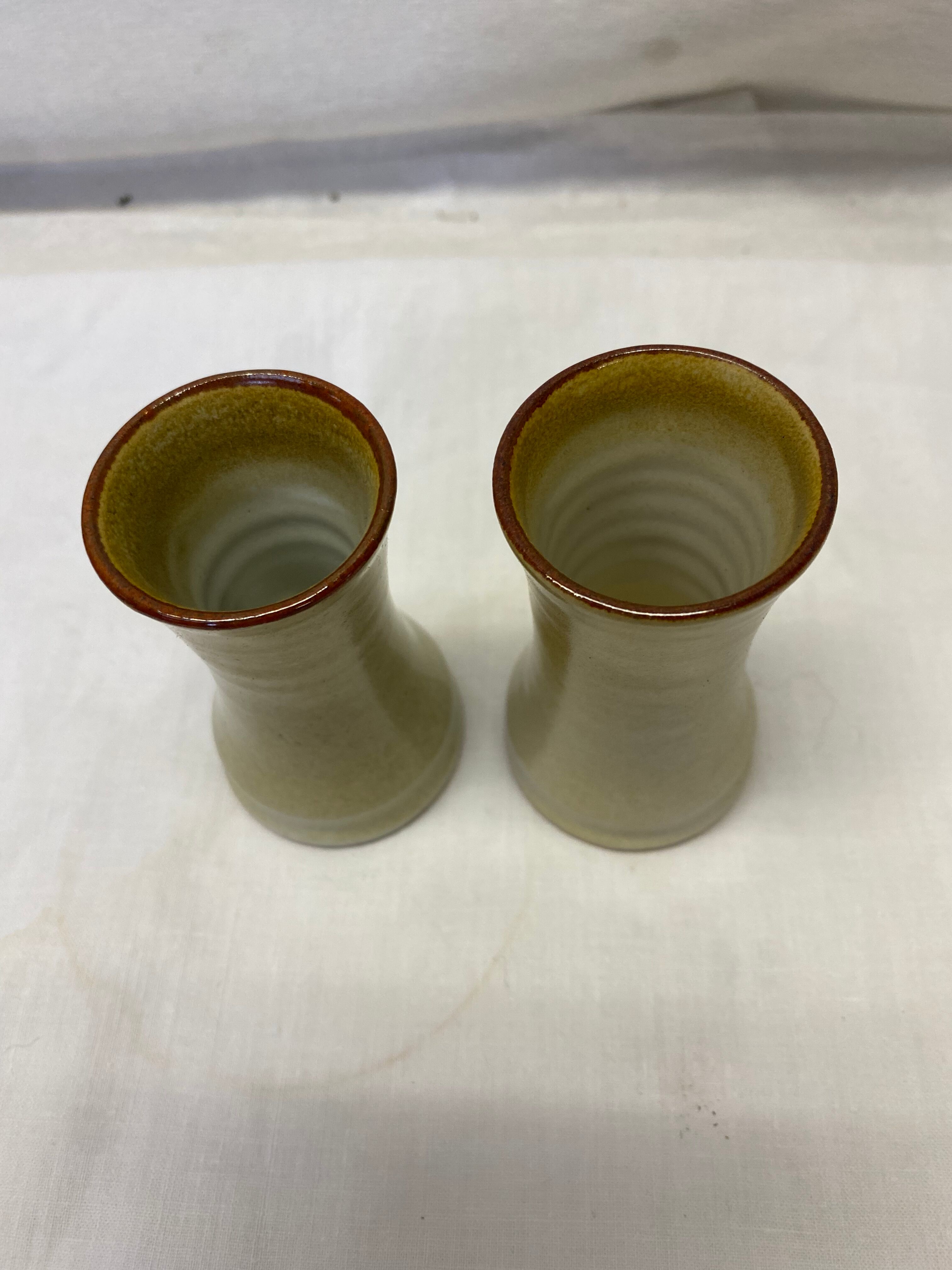 Pair of sandstone candle holders