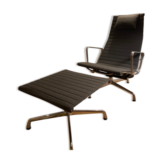 Eames EA 124 Lounge Chair and its EA 125 Footrest