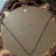 Ancient witch's eye mirror Dollanzo Italy in gilded wood