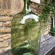 Green and oval demijohn