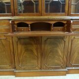 Scribanne bookcase in mahogany veneer English work of the twentieth century