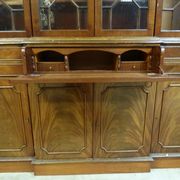 Scribanne bookcase in mahogany veneer English work of the twentieth century