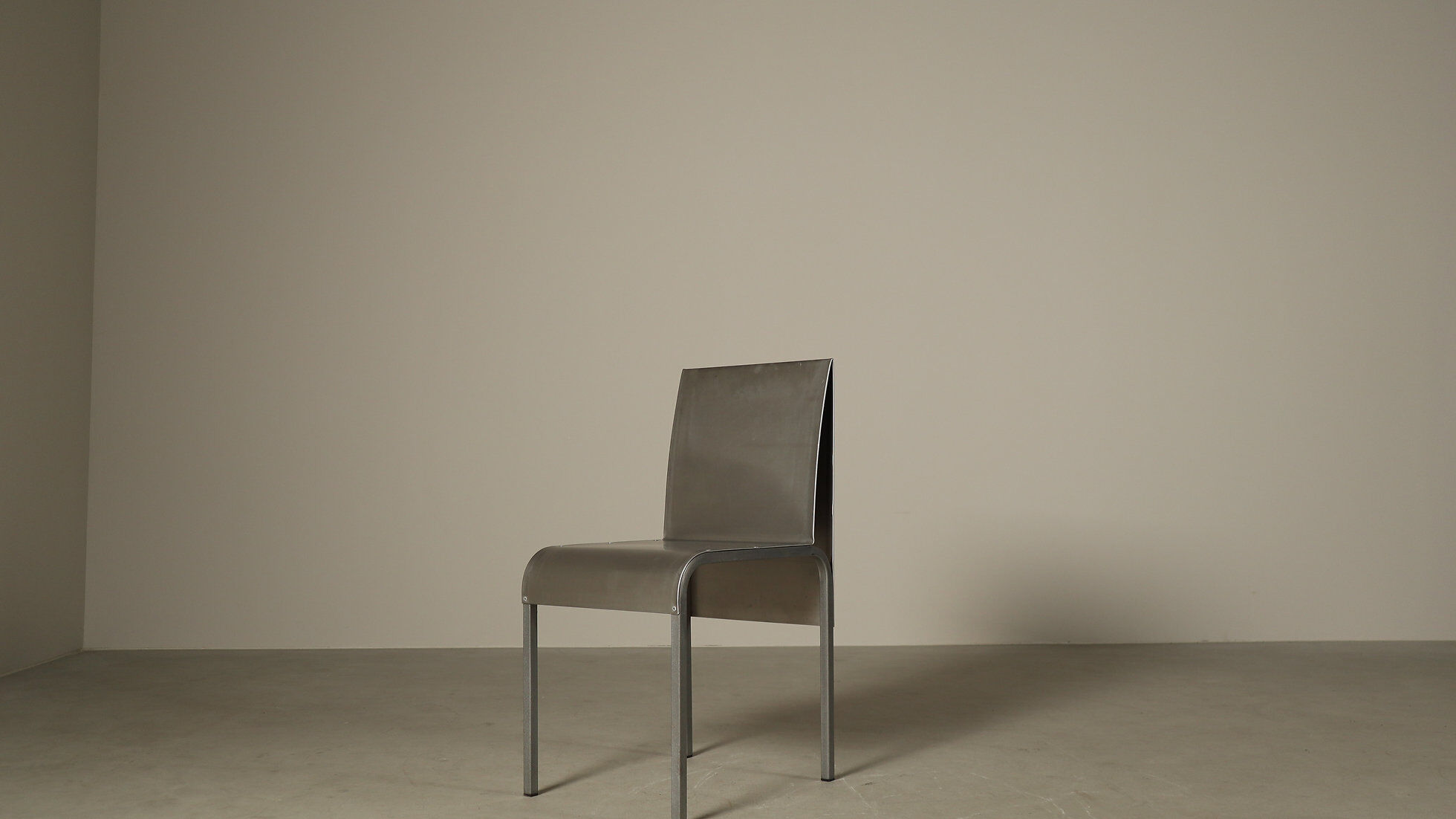 Set of six postmodernist stainless steel dining chairs from circa 1980-1990.