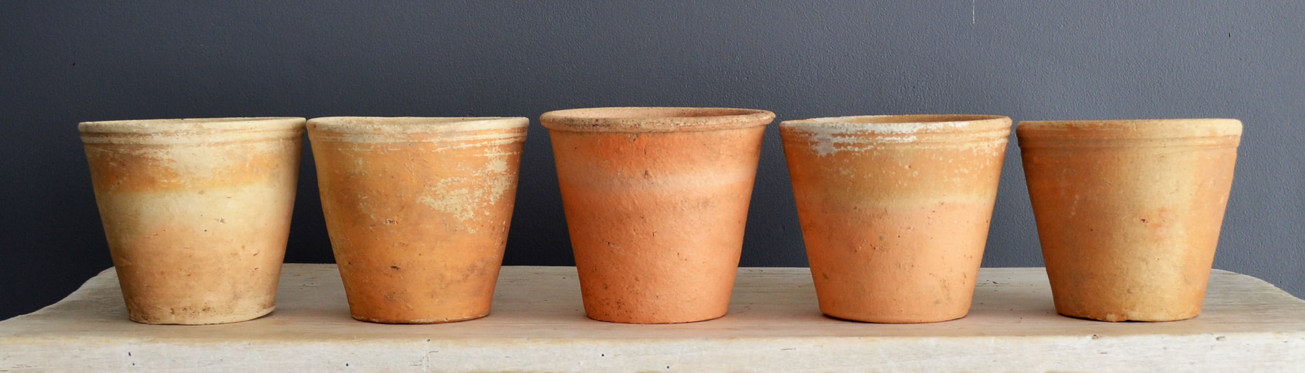 5 old terracotta pots