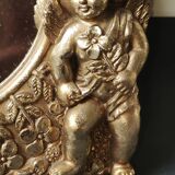 Shabby Chic round mirror. Putti/Cherub decor. Floral motifs. Dimensions: 20 x 20 cm.