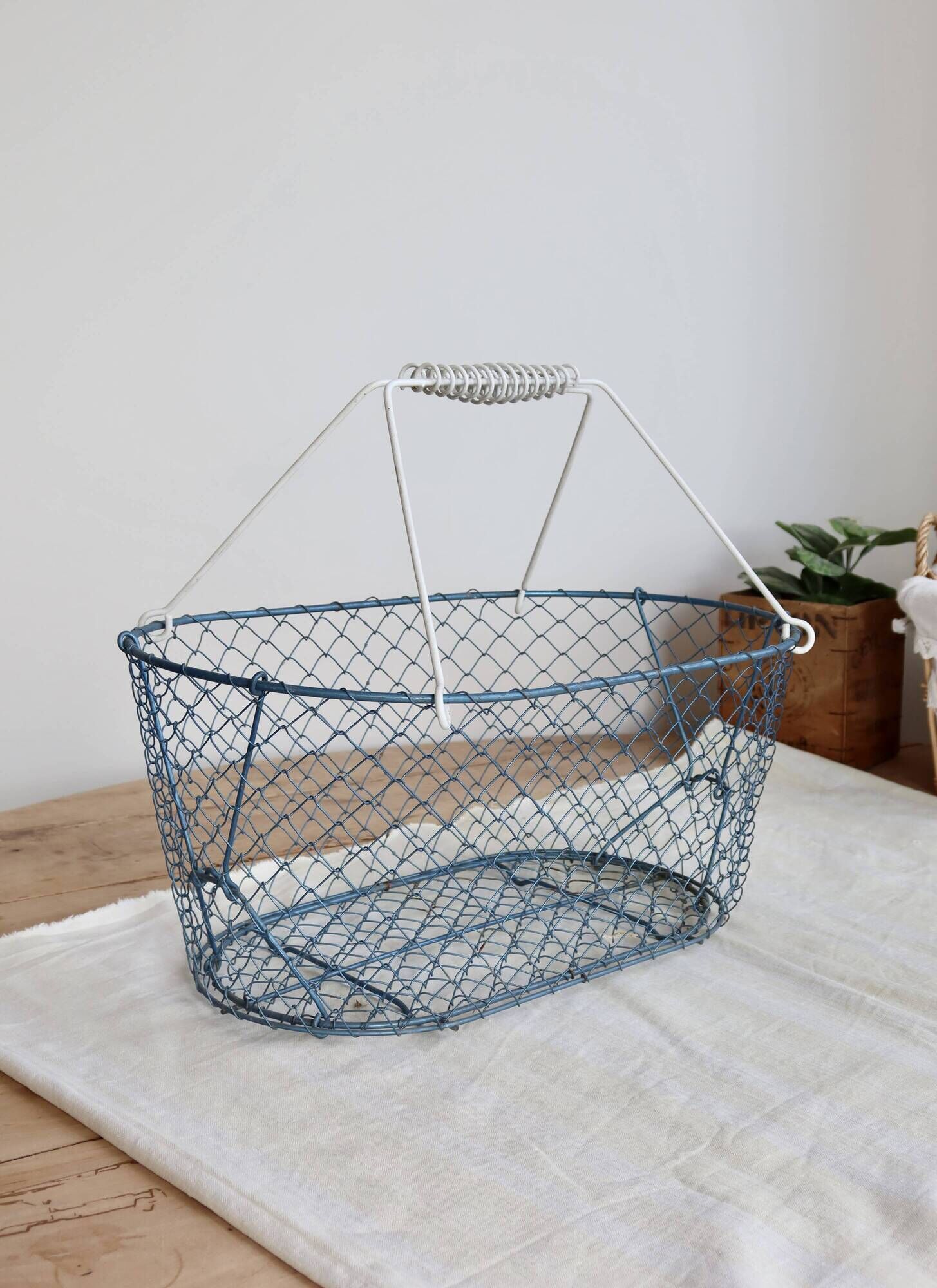 Large vintage blue wire basket