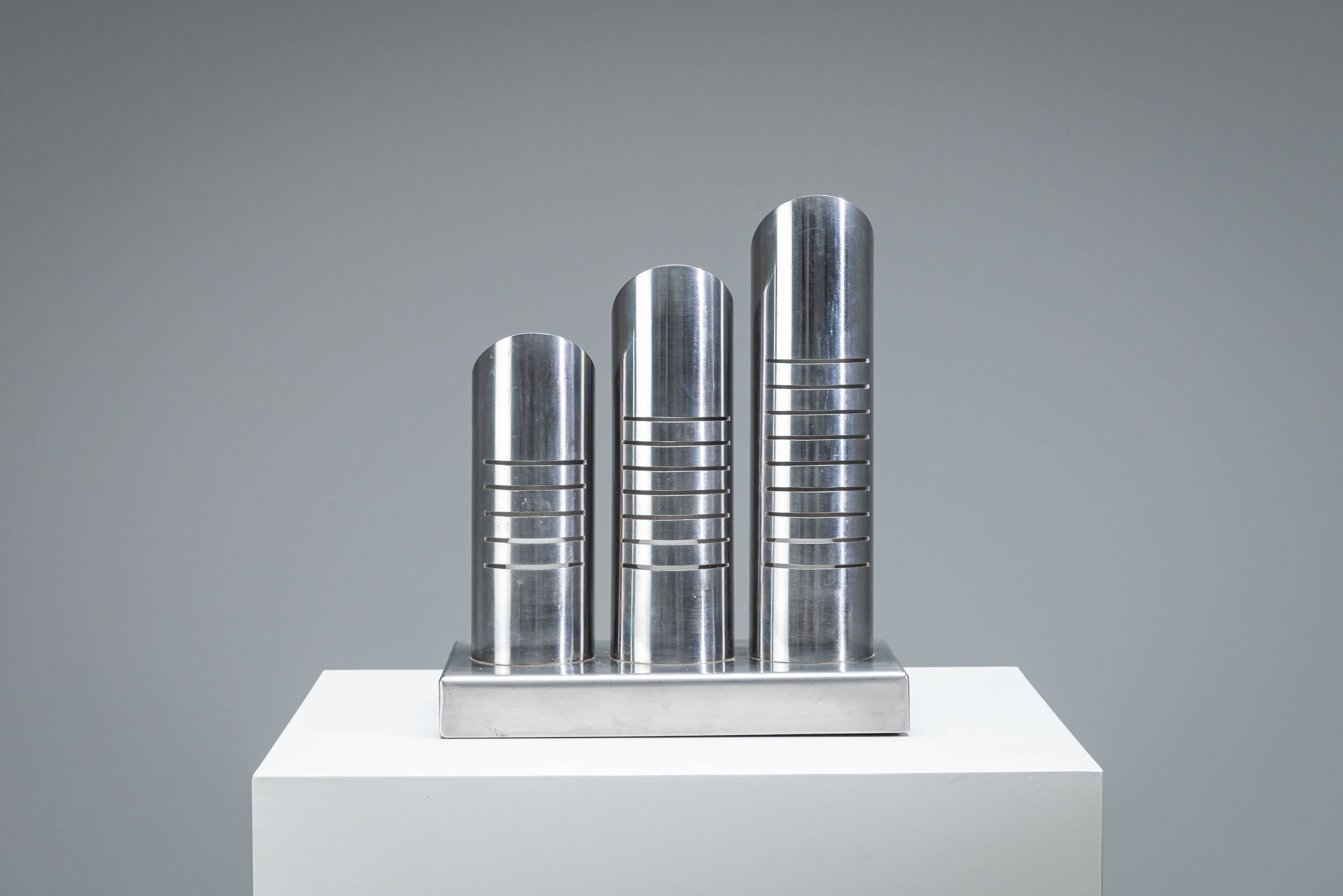 Triple column table lamp in stainless steel by Goffredo Reggiani