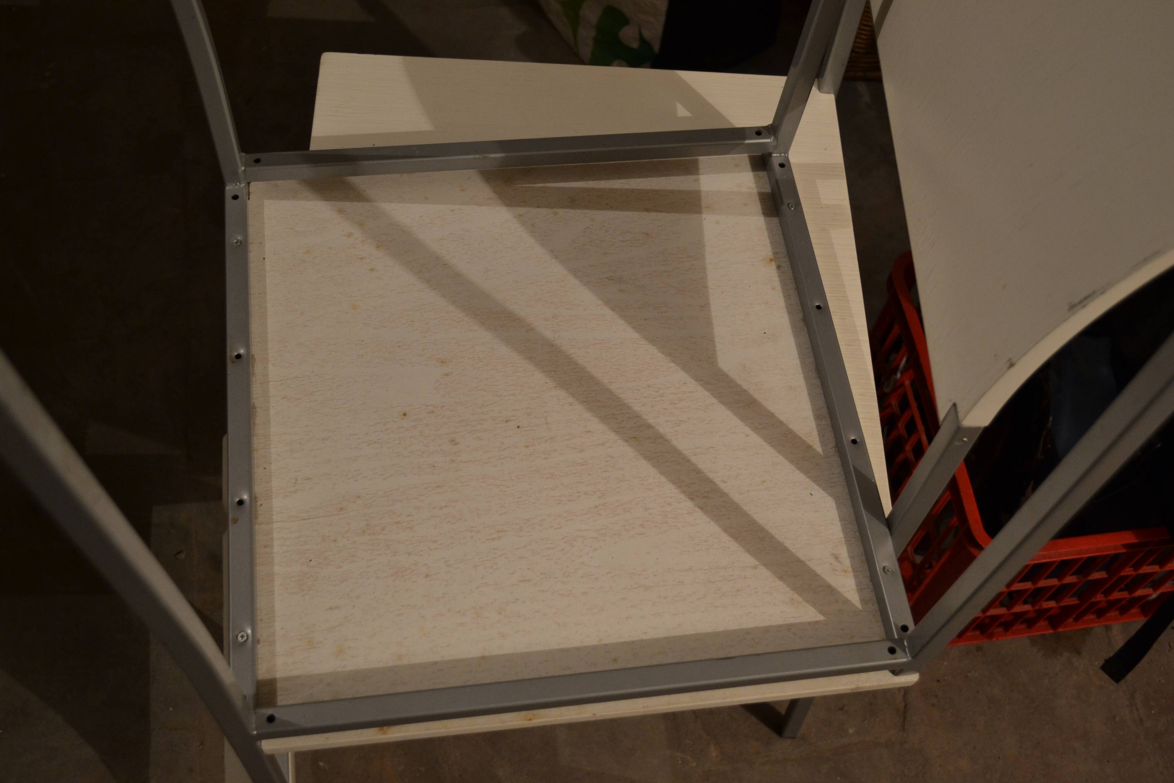 Set of 4 vintage metal and wood chairs from the 1990s.