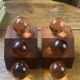 Wooden bookends and spherical glass balls