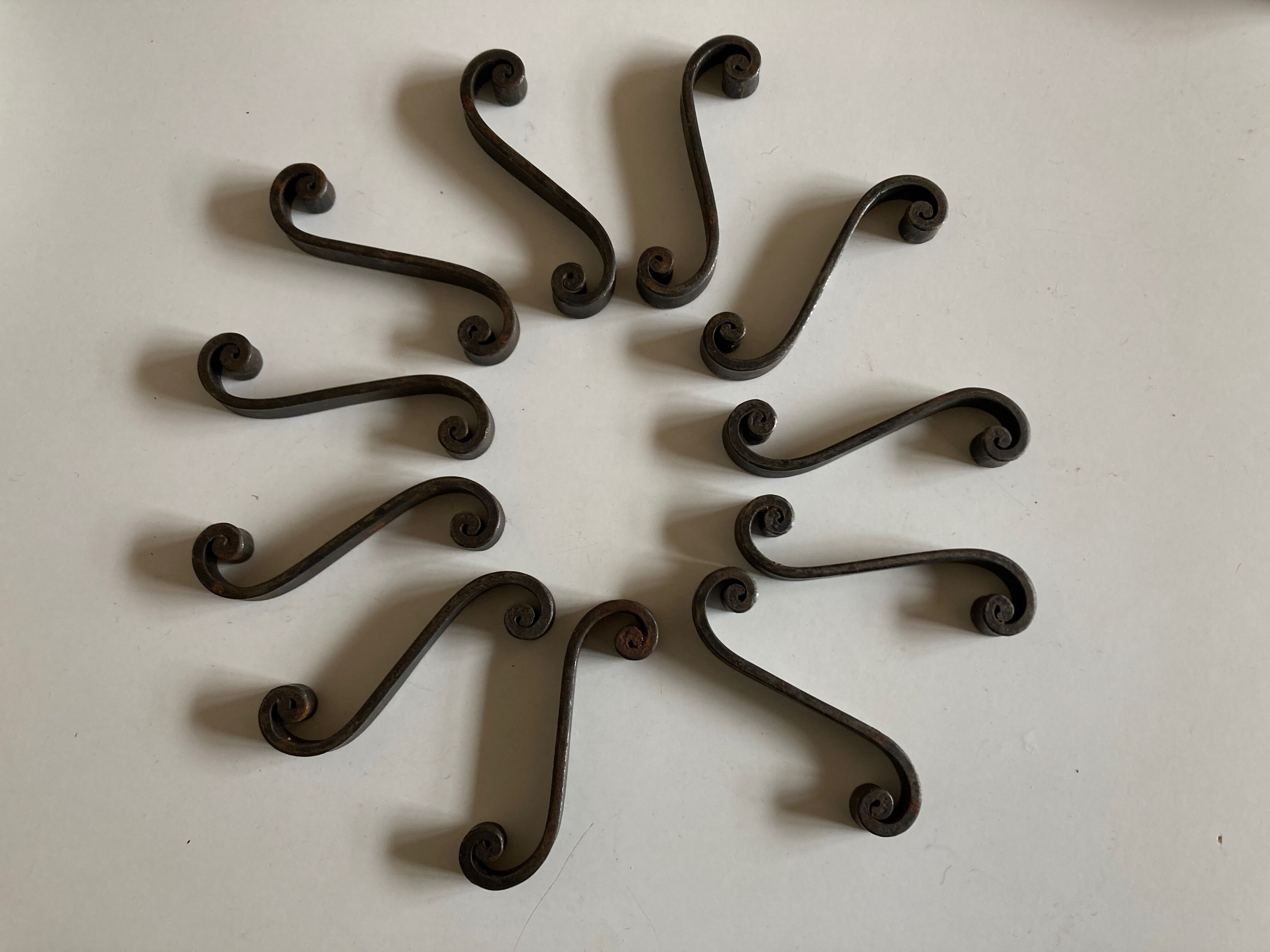 Set of 11 knife holders in beaten iron Provence 1950