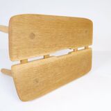 Sculptural mid-century stool in solid oak by Carl Gustaf Boulogner, Sweden, 1950s.