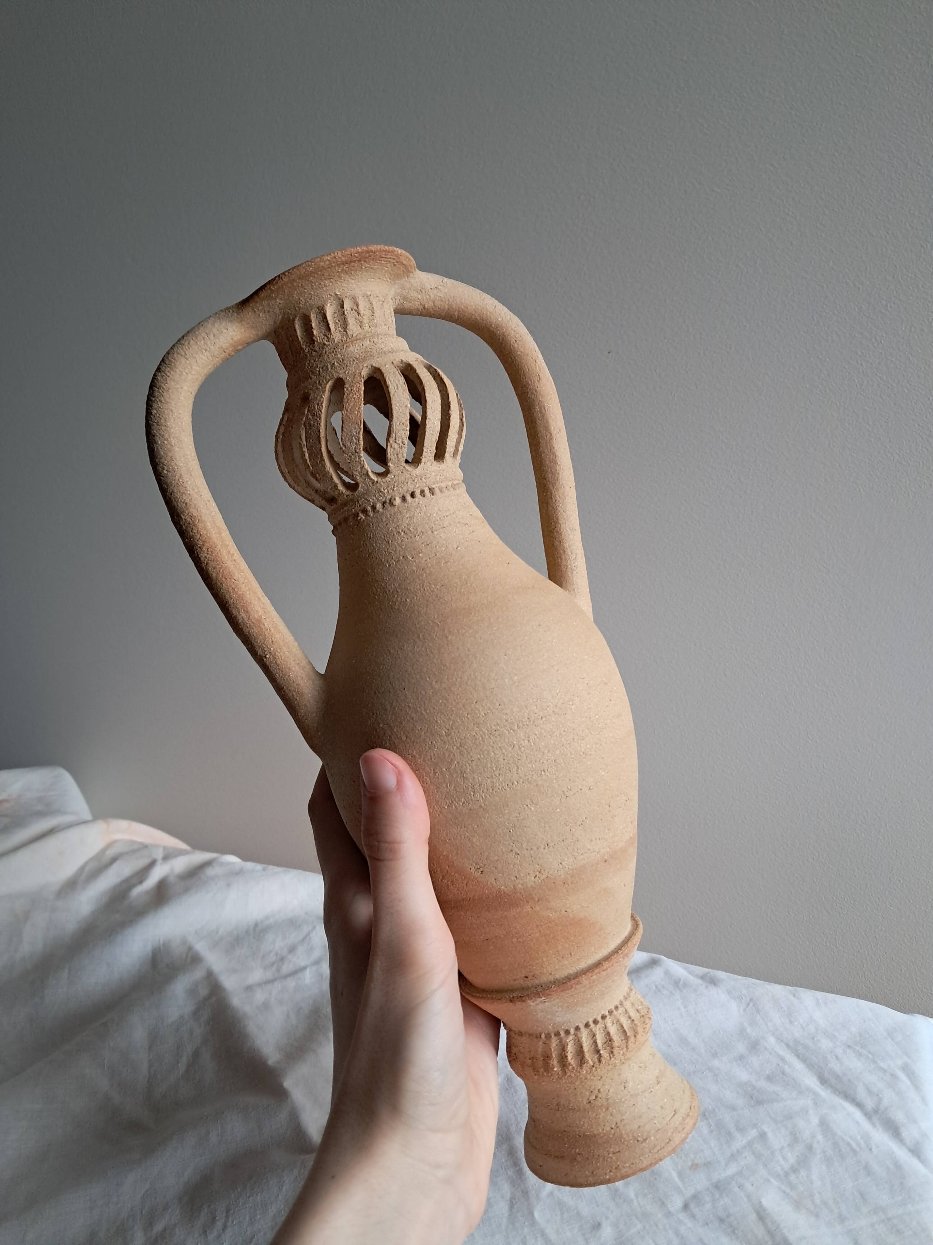 Large pierced stoneware vase