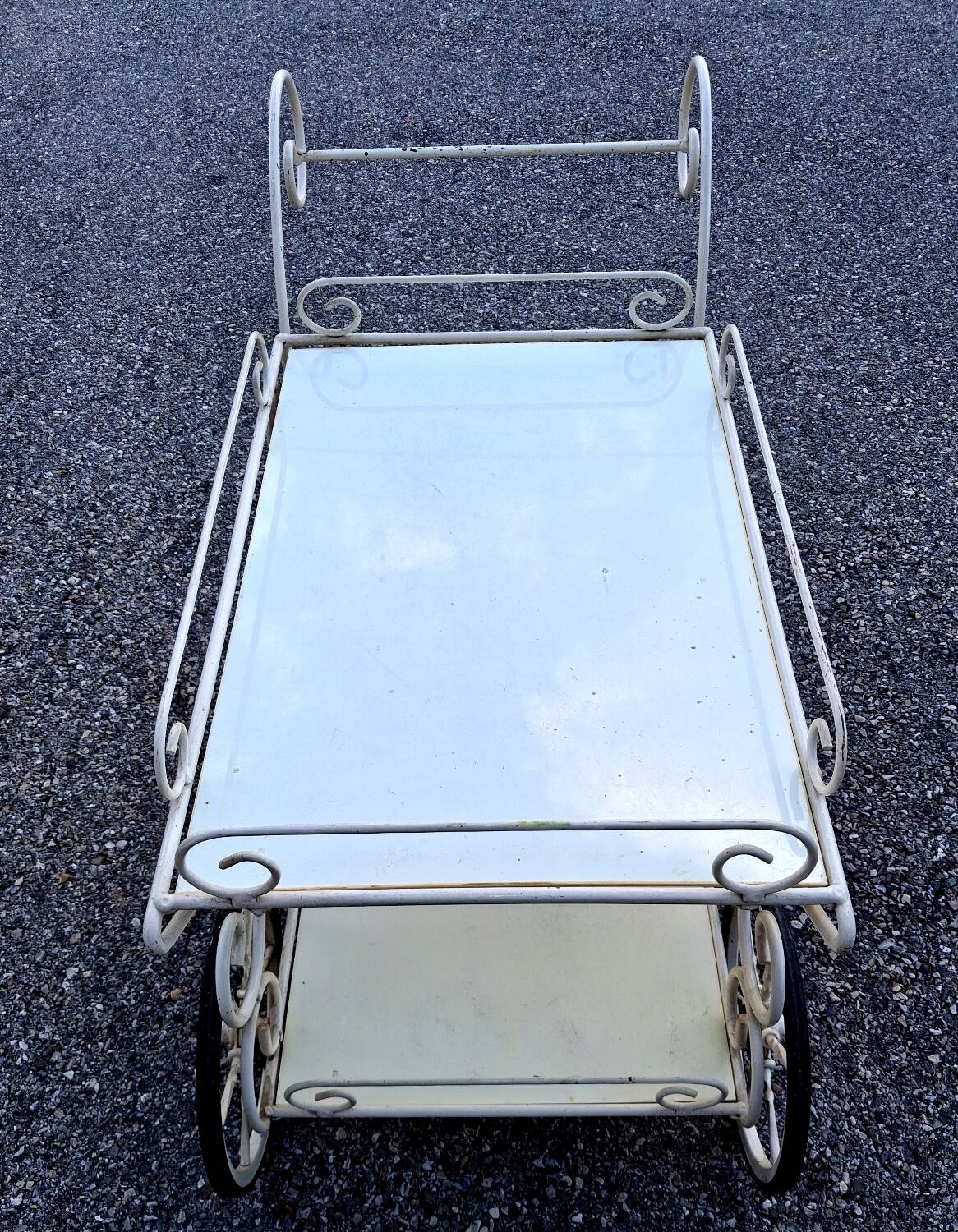 White wrought iron terrace or garden table.