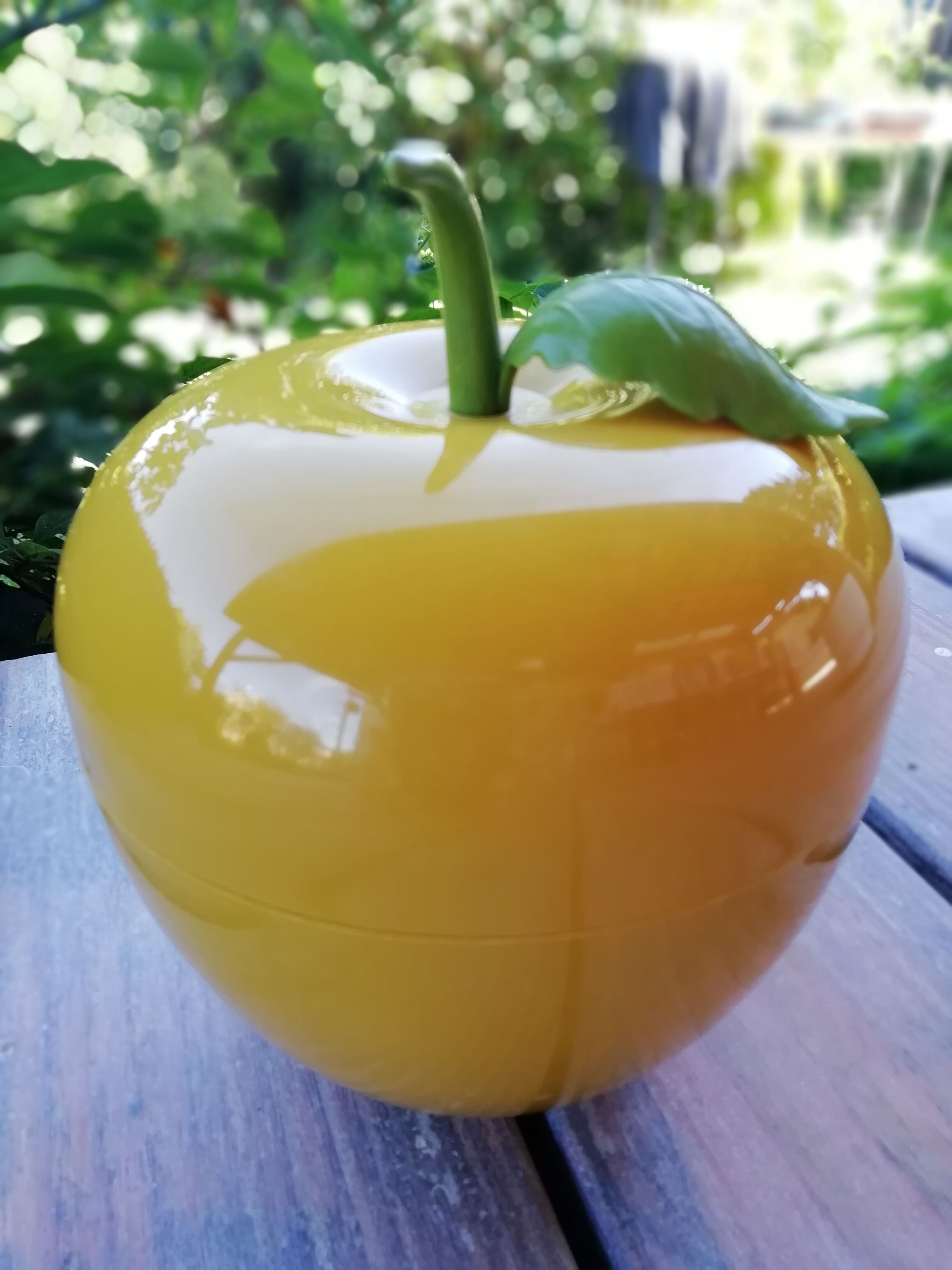 Mustard yellow ice cube apple