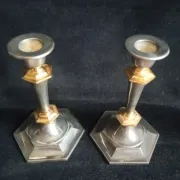 Pair of small English candlesticks in silver-plated metal and brass - 20th century.