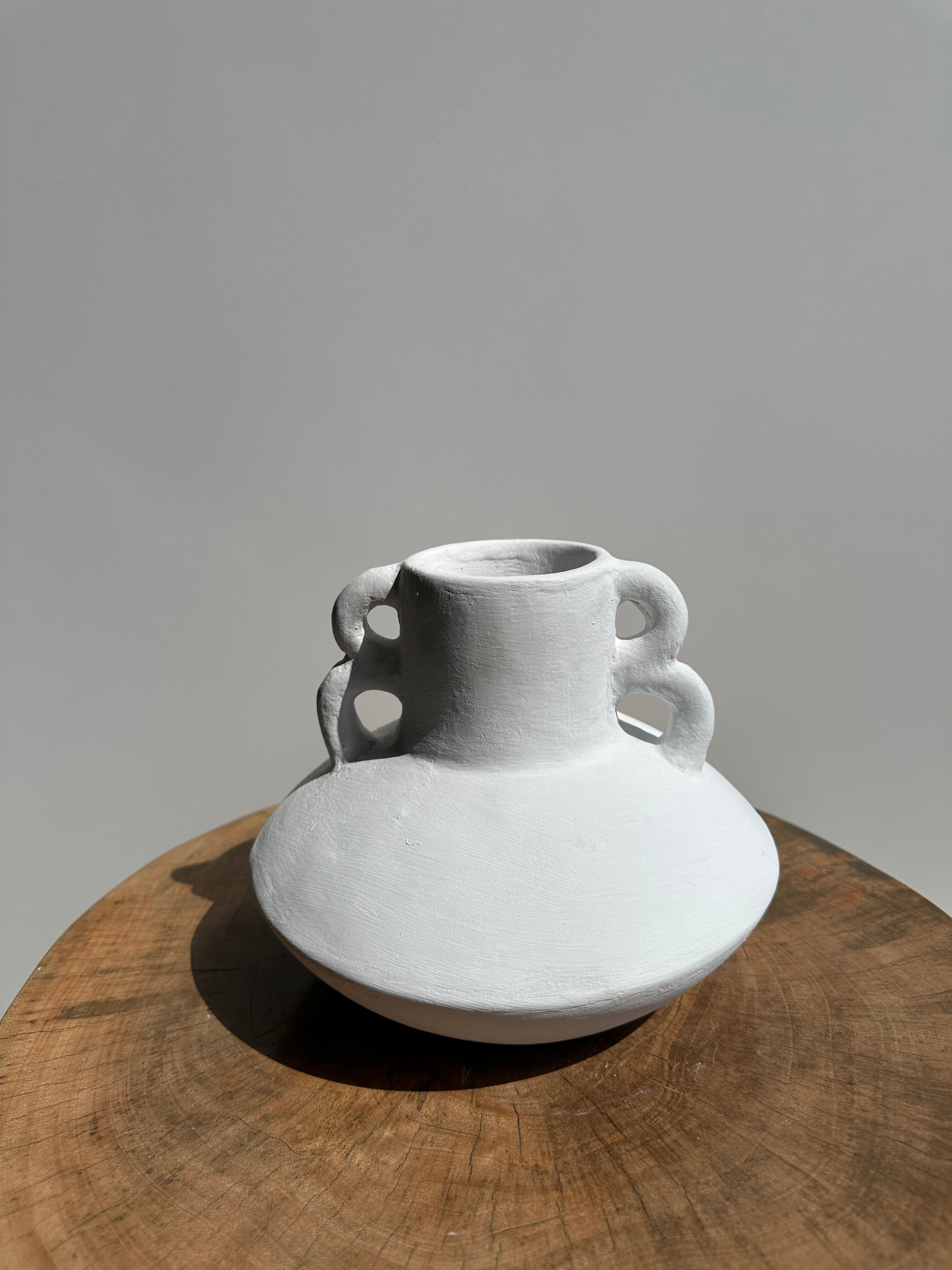 Handmade terracotta vase painted white with double handles H:16 D:20