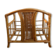 Wicker rattan magazine rack with vintage caning