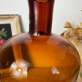 Large amber glass apothecary bottle with spout