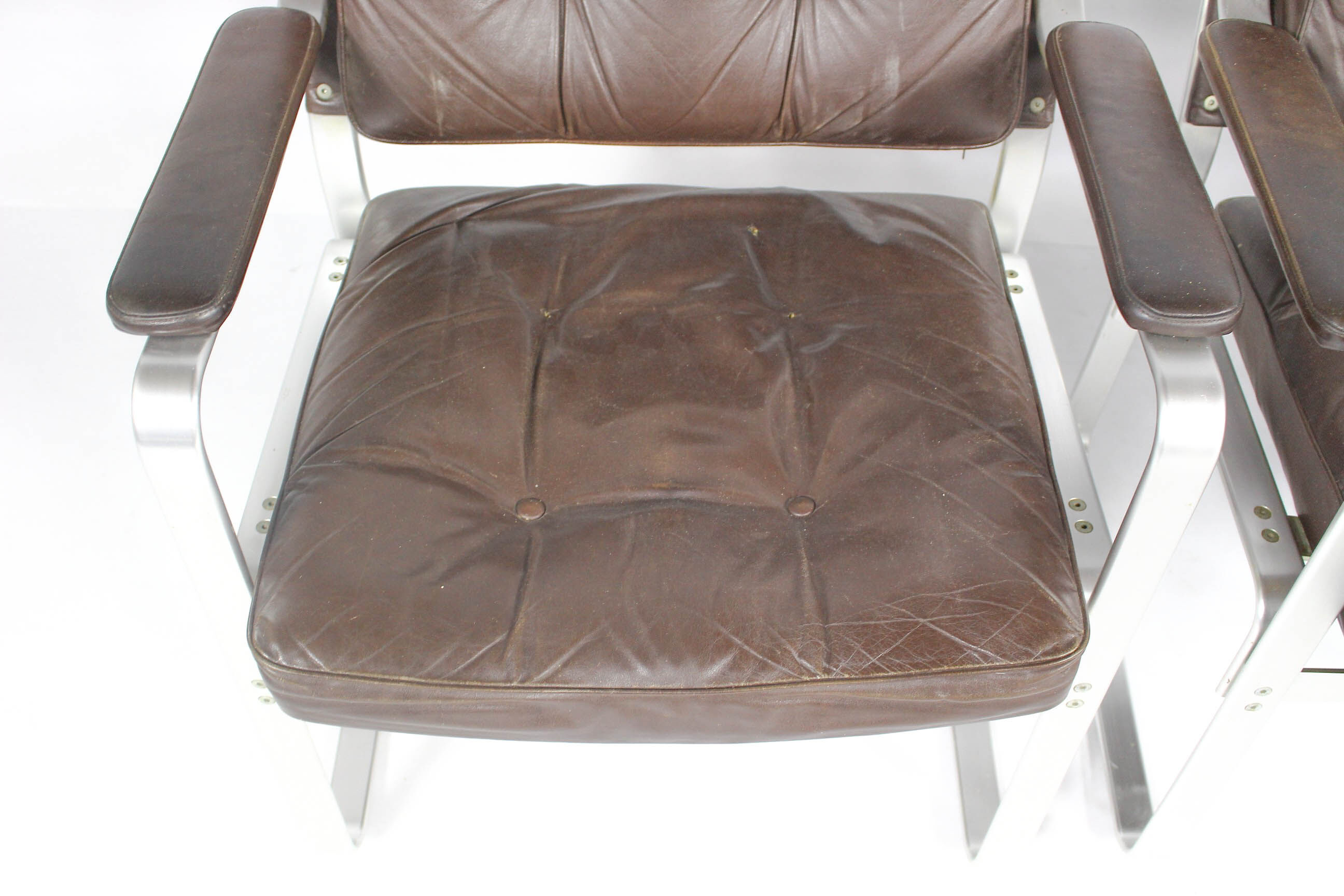 Swedish Mid Century Leather And Aluminum Armchairs By Karl Erik Ekselius For Joc Vetlanda, Set Of 4