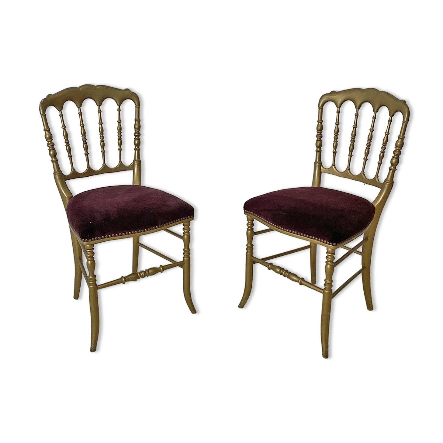 Pair of Charivari chairs in gilded wood