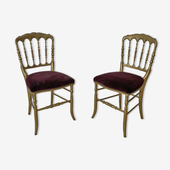 Pair of Charivari chairs in gilded wood