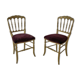 Pair of Charivari chairs in gilded wood