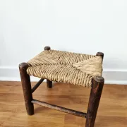 Small rustic vintage wooden and straw stool -
