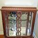 A Louis XV style display cabinet with three beechwood shelves and a white marble top.