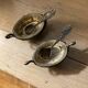 Salt and pepper shakers with silver spoons