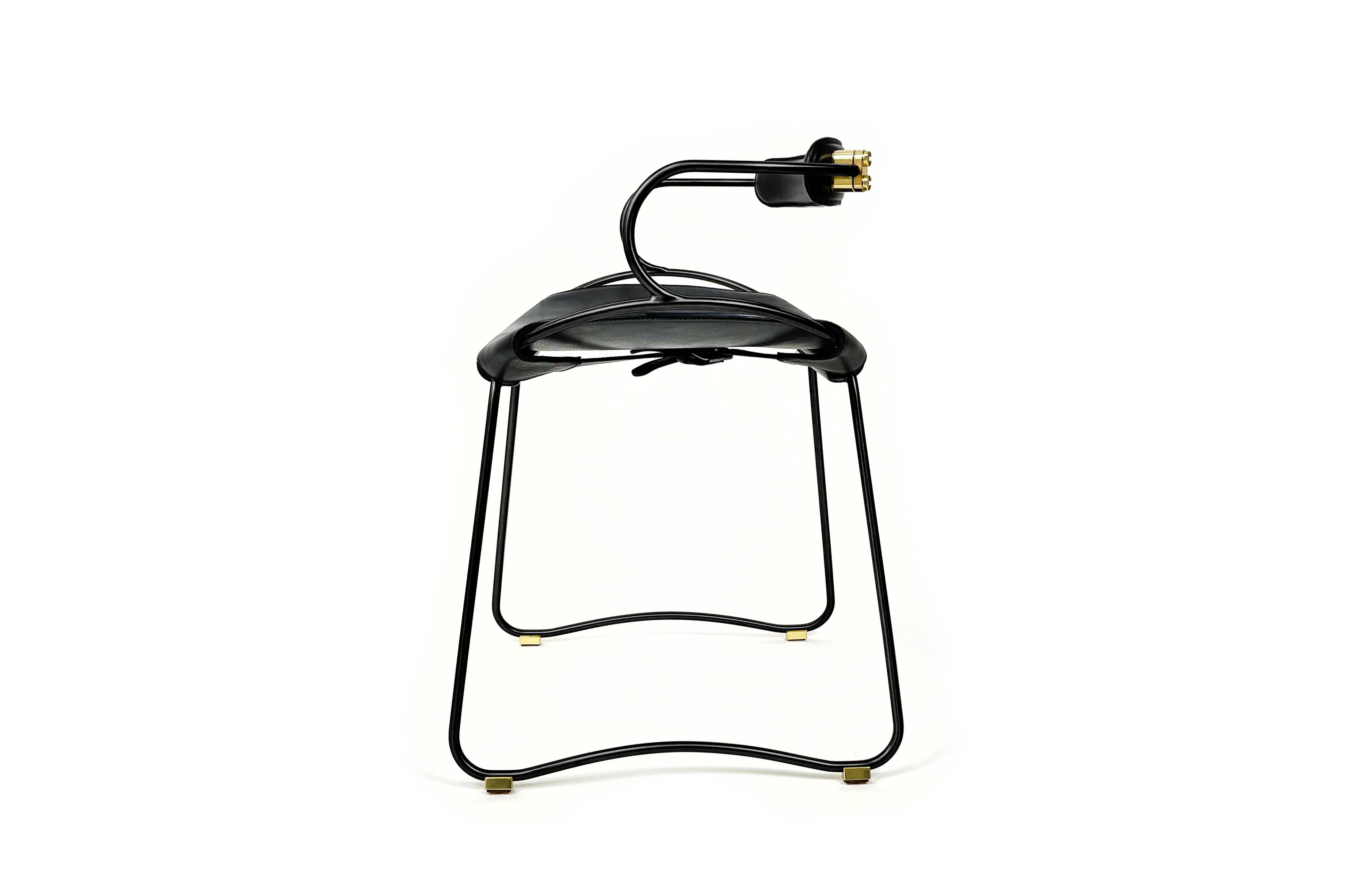 Contemporary kitchen bar stool with black steel backrest.