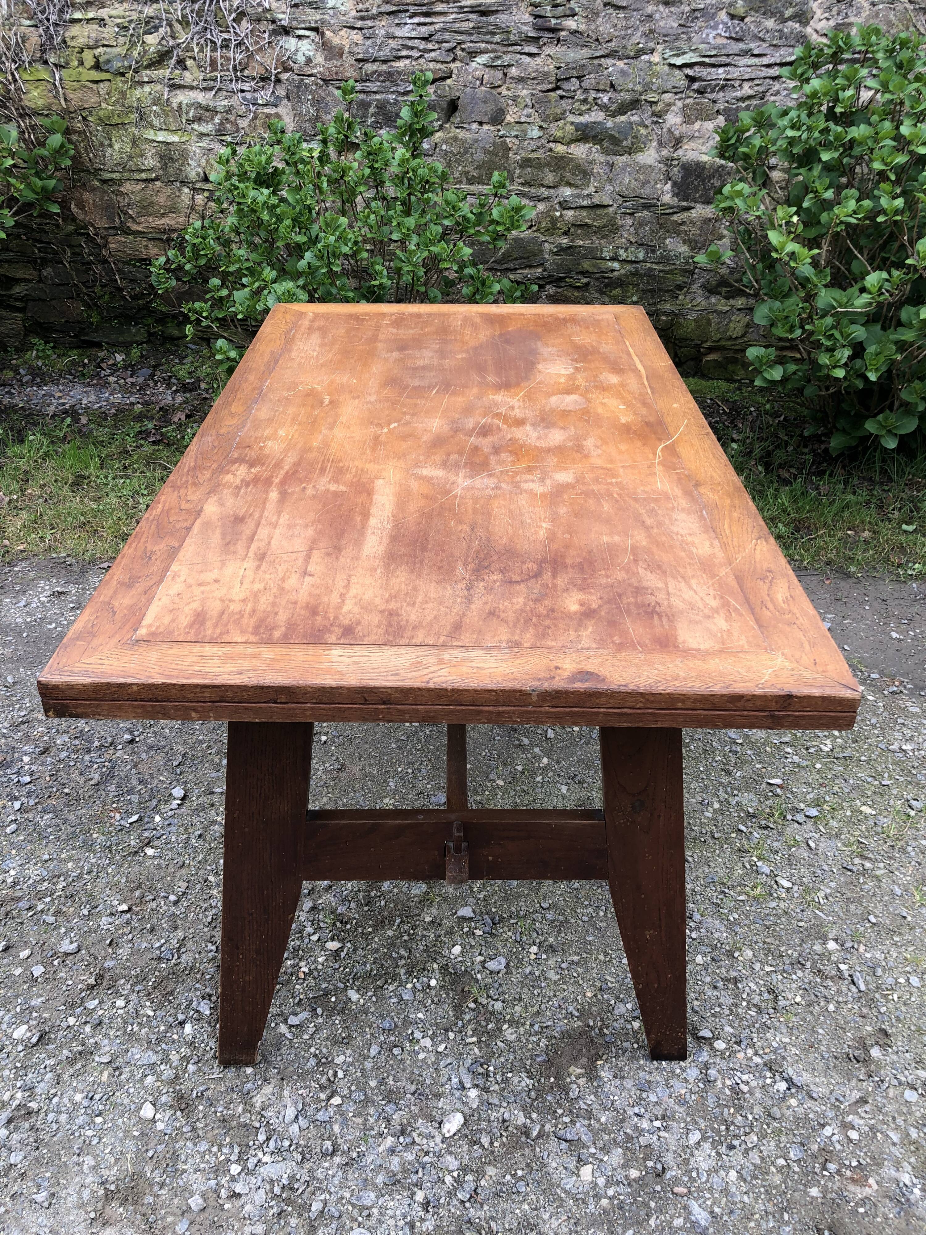 Vintage René Gabriel oak table from the reconstruction period.
