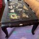Chinese black lacquer coffee table with figurative decoration – Coromandel style – 20th century.