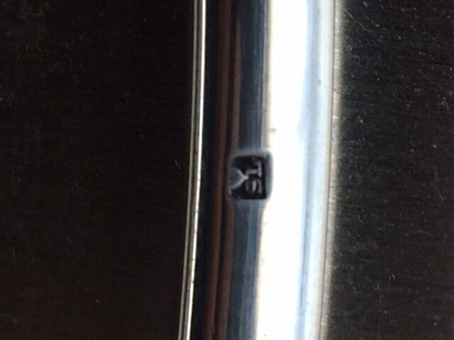 Silver metal modernist table mat