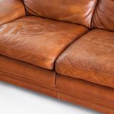 Vintage three-seater leather sofa. Edition by Roche Bobois. France, 70s-80s