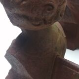 Pair of cast iron fireplace chenets "children"