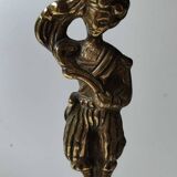 Pair of anthropomorphic candlesticks/Servants of the king holding the flame. In gilded bronze