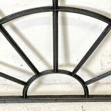 Old arched anthracite grey window