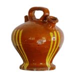 Cruche ou gargoulette ancienne en faïence française à glaçure rayée jaune