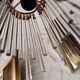 Brass wall light with crystal pendants