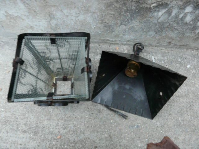pair of wrought iron lanterns and granite glass