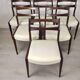 6 white leather Scandinavian chairs