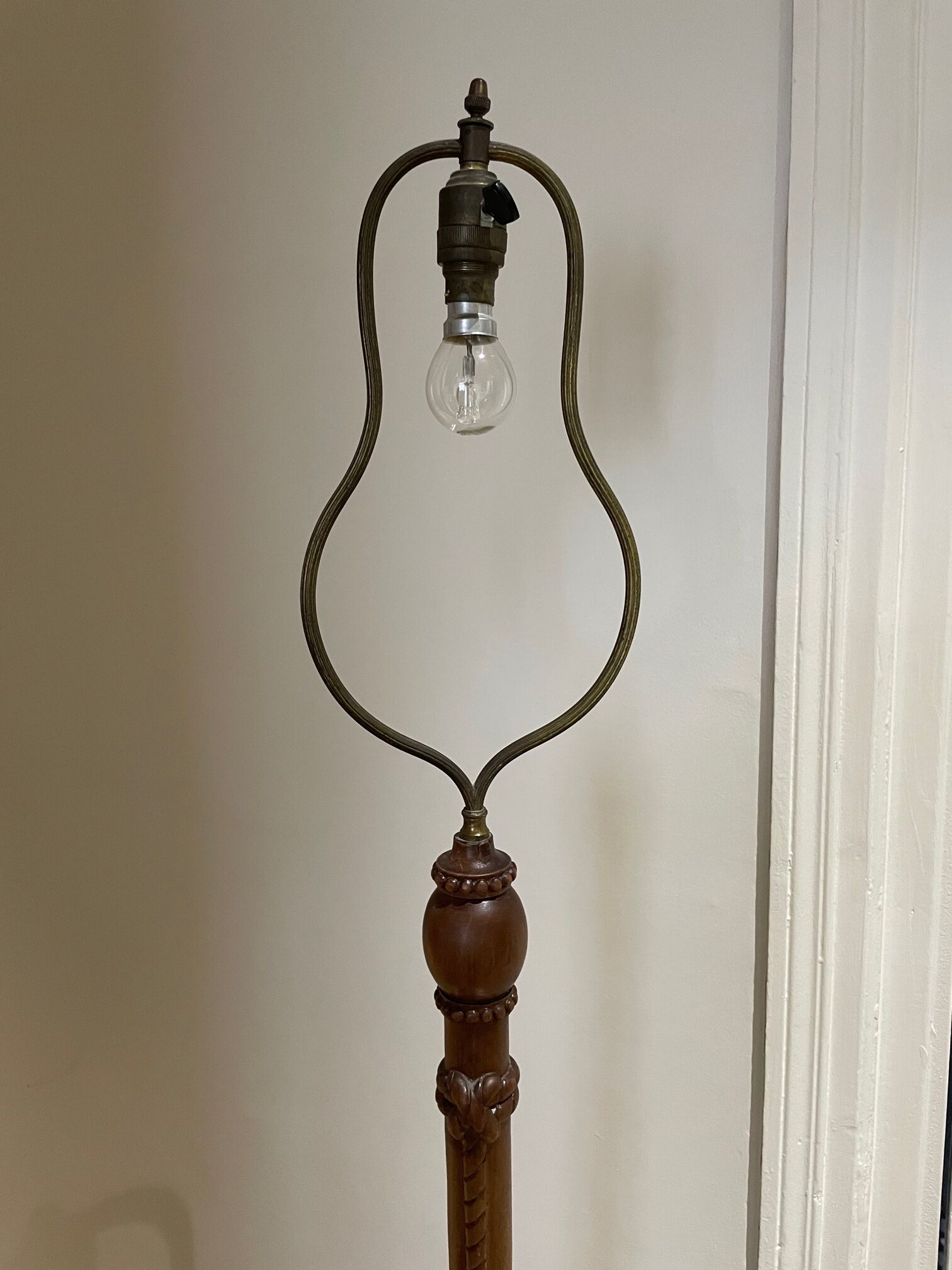 carved wooden floor lamp from the 40s