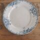 Round serving dish in iron earth