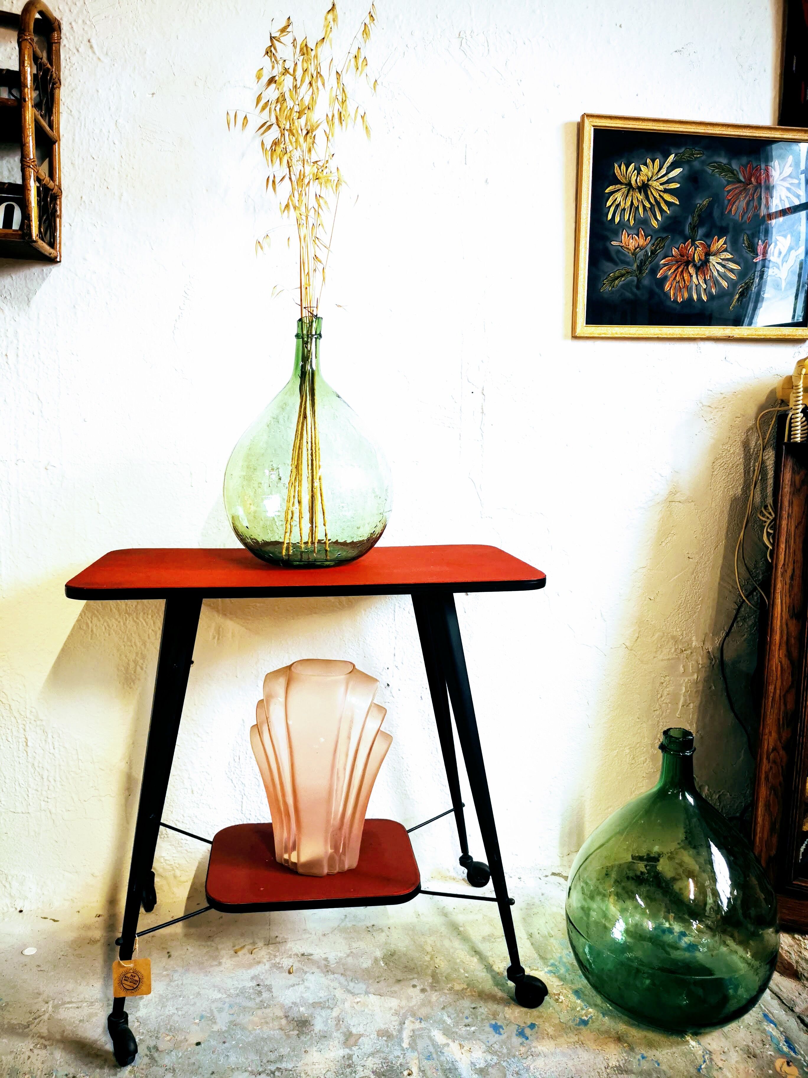 Green demijohn contains 12 liters