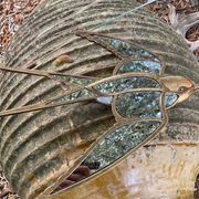 Miroir en forme d'hirondelle