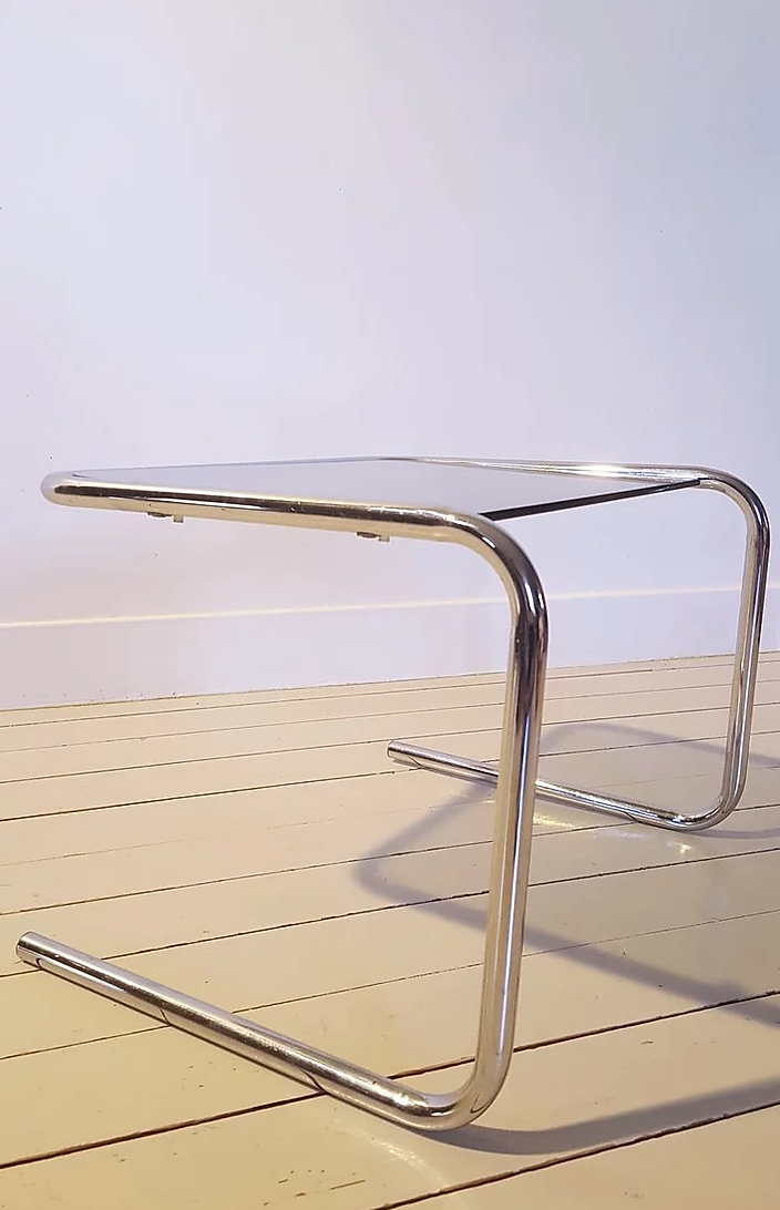 Smoked glass and chrome metal sofa tip