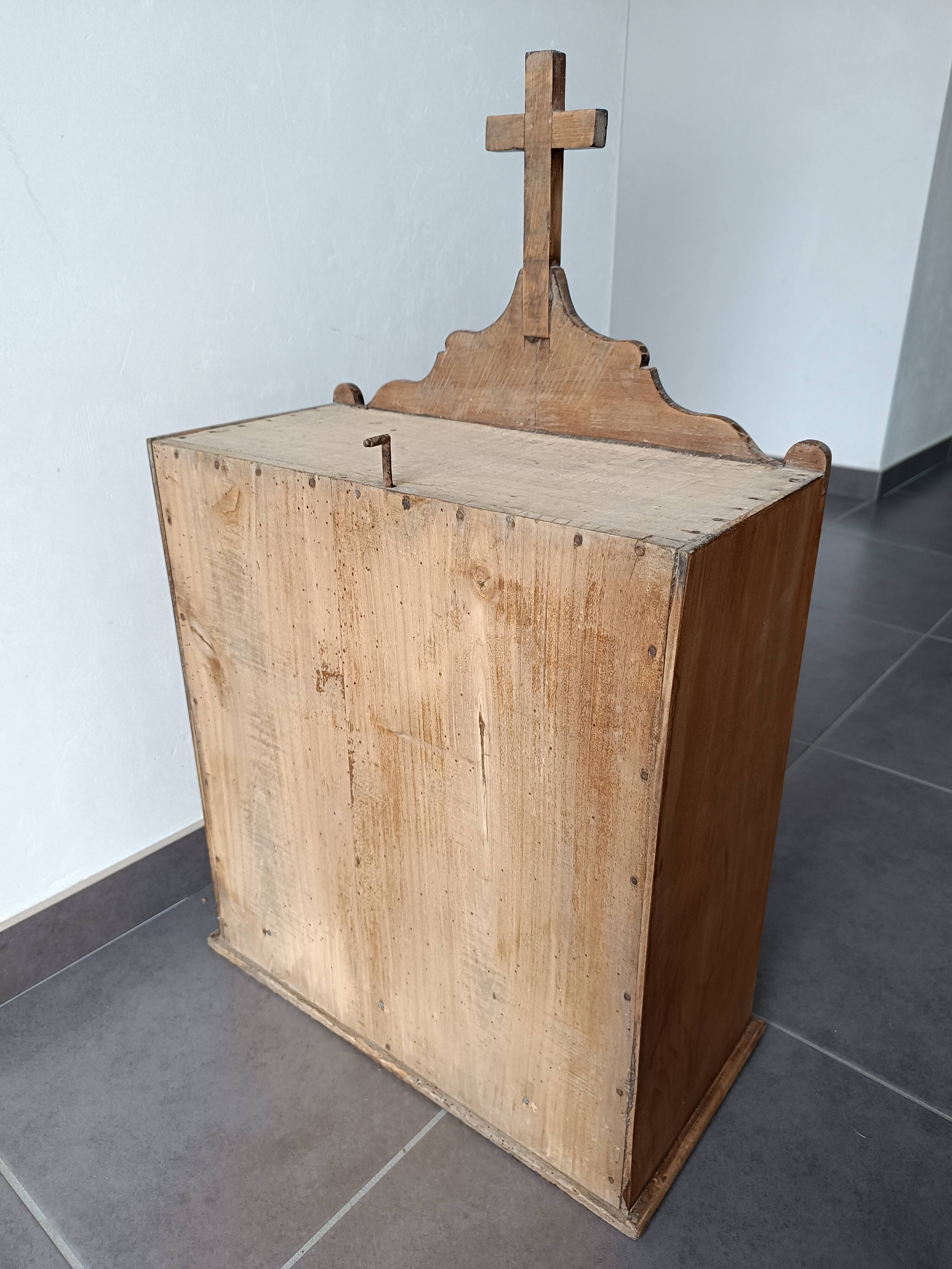 Old religious statuary display case